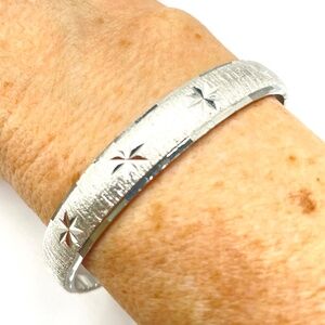 Monet Signed Frosted Silver Tone Etched Bangle Bracelet